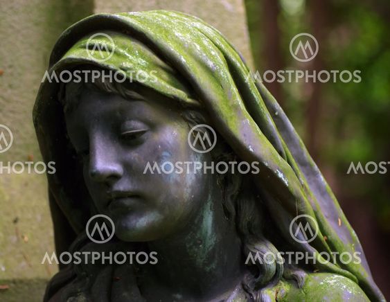 Vintage cementery sculpture face