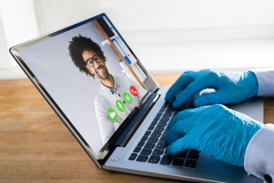 Man On Coronavirus Quarantine Using Video Conference