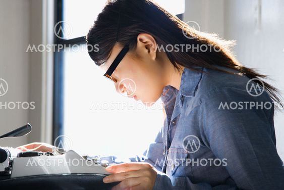 Woman with typewriter.