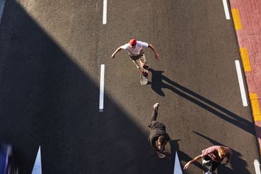 Active, skating and friends with skateboard, group and...