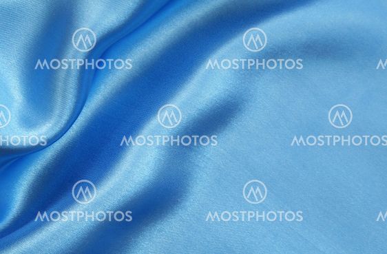 Smooth elegant blue silk as background