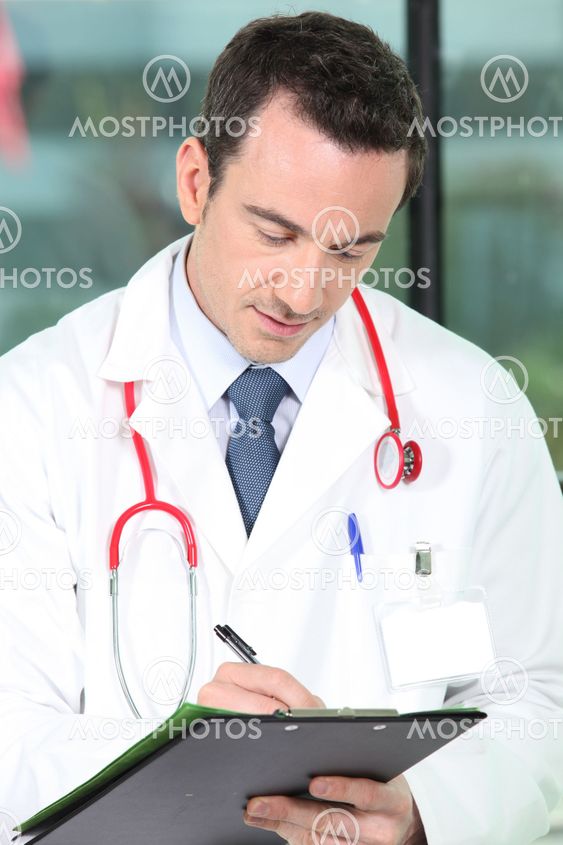 a doctor writing a prescription