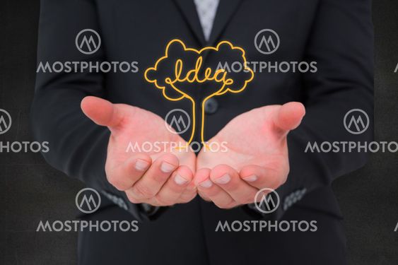 Composite image of businessman holding his hands out