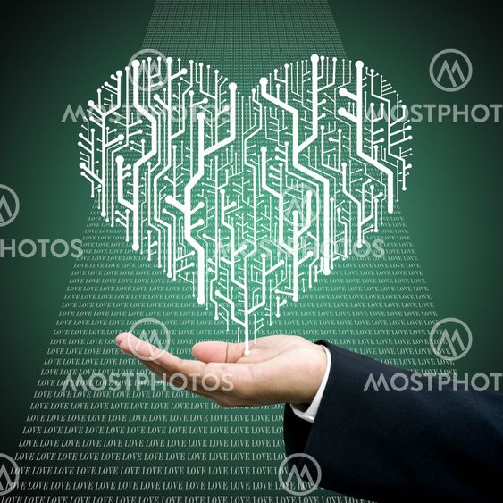 Businessman carry the Circuit board in heart shape