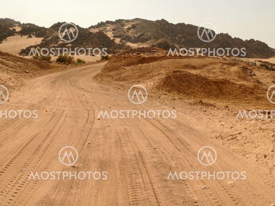 The road running through the Sahara desert.