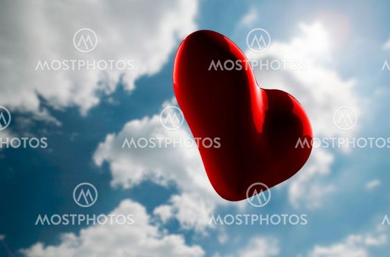 Romantic Red Heart On Cloudy Sky