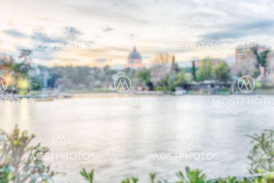 Defocused background with the lake of EUR in Rome, Italy