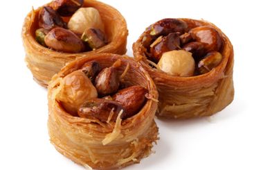 Traditional Middle Eastern dessert featuring layers of...