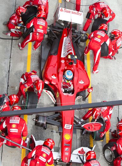 Alonso pitting for tires at the Malaysian Formula 1