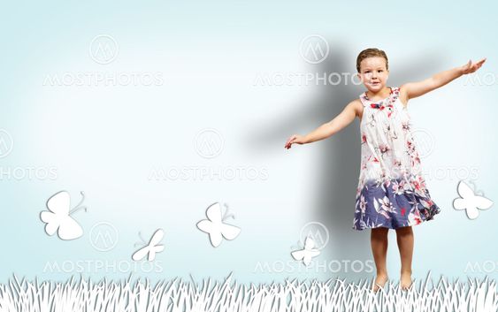 Girl jumping in a color dress