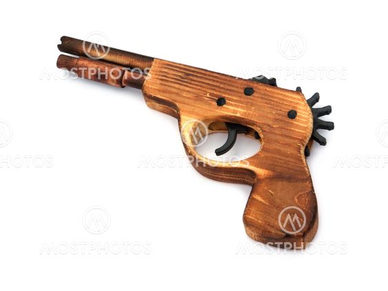 Toy wooden gun , on a white background