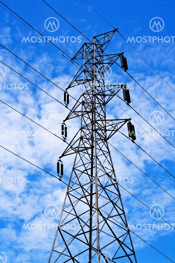 high voltage post.High-voltage tower blue sky background.