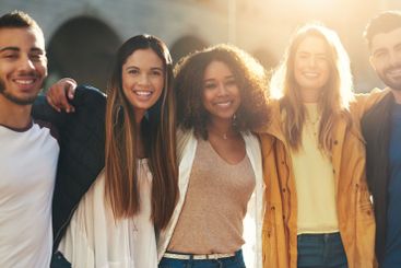 Hug, portrait and group of friends in city for smile,...