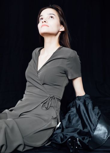 Beautiful fashionable woman in gray summer dress and...