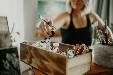 Paint choice, art and woman hands choose color option,...