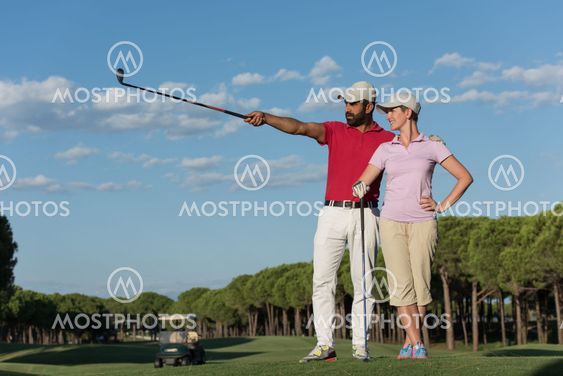 portrait of couple on golf course