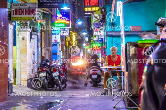 Nightly street scene of a side street in Ho Chi Minh City