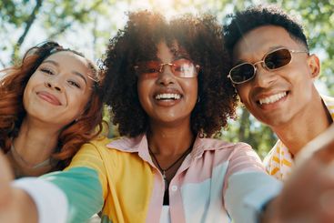 Holiday, happy people and friends in park for selfie...