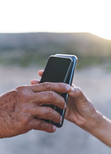 Closeup, people and hands with smartphone for...