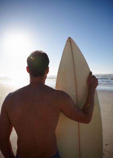 Back, sports and vacation with surfer on beach in summer...