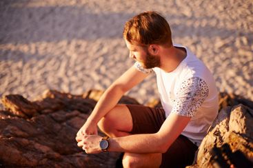 Relax, thinking and travel with man at beach for summer...
