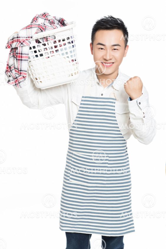 male holding a laundry basket