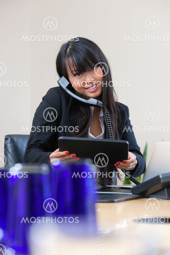 Beautiful businesswoman talking on the phone