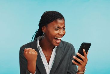 Excited, phone and black woman with celebration in...