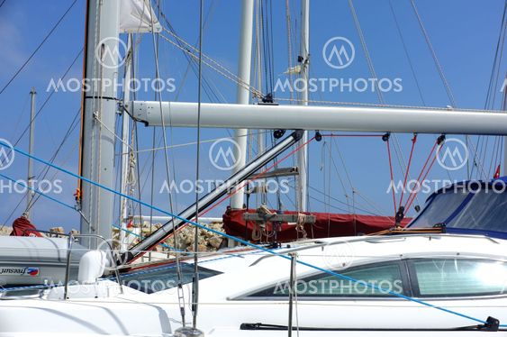 Yacht and poles in marina