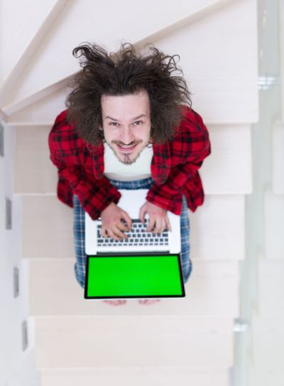 freelancer in bathrobe working from home