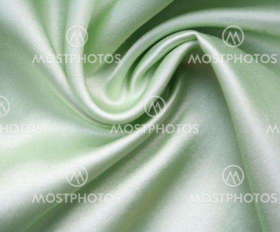 Smooth elegant green silk as background