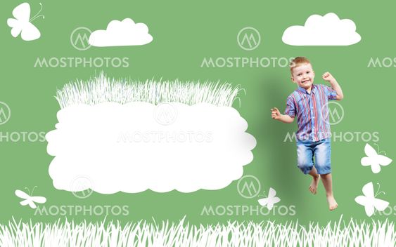 boy jumping on the background of painted wall
