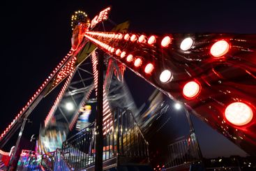 A colourful pirates boat  in Luna park during night.