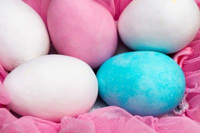 Easter eggs composition over pink background