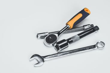 Different types of hand tools arranged for mechanical...