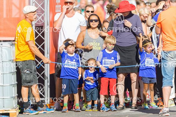 Young kids and parents waiting for the start at the...