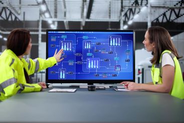 Young female engineer uses modern technology