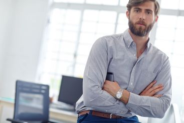 Man, arms crossed and professional architect in office,...
