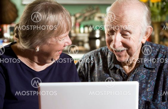 Senior Couple with a Laptop Computer