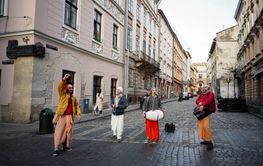 Group of Krishnaites Dance Street Musicians Performing in...