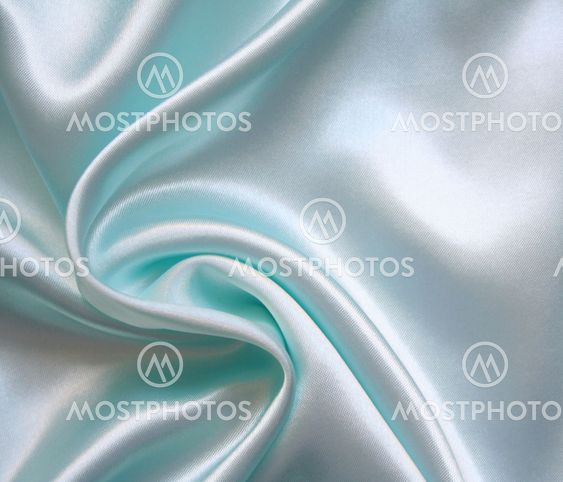 Smooth elegant blue silk as background