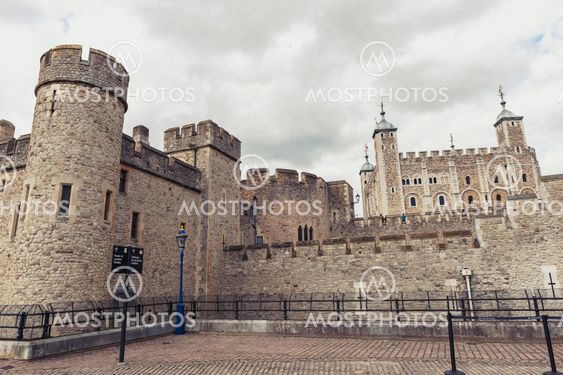 London, UK - April 2018: Exterior view of Her Majesty's Royal Palace and Fortress of the Tower of London, a historic castle and popular tourist attraction located on the north bank of the River Thames in central London, England
