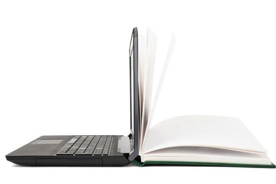 Open book turns into an open laptop