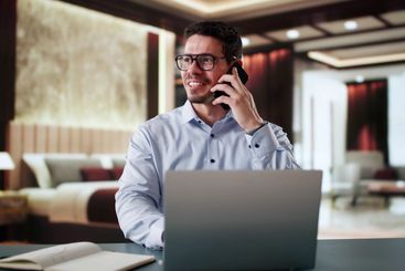 Entrepreneur Man In Hotel On Business Travel Vacation