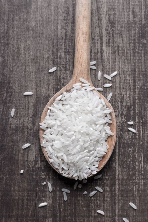 Rice With Wooden Spoon.