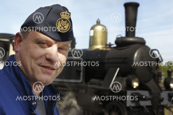 Steam train personnel in steam locomotive