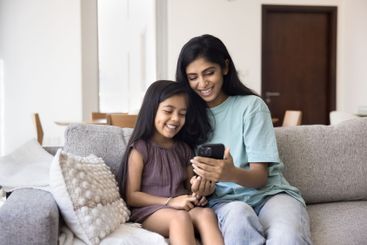 Indian mother spend time with little 5s daughter using...