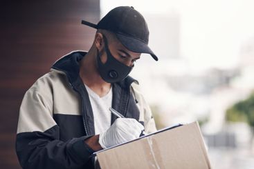 Box, mask or delivery man writing order for safe...