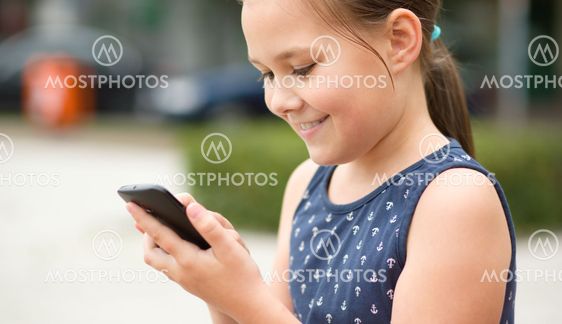 Girl is using smartphone