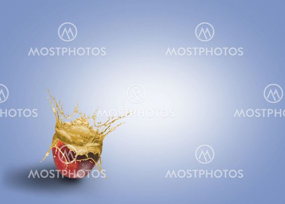 fresh juice pouring out of the apple